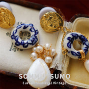 European medieval retro style ancient Roman Apollo gold coin gilded ceramic natural pearl earrings