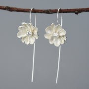 Elegant sterling silver petal long earrings