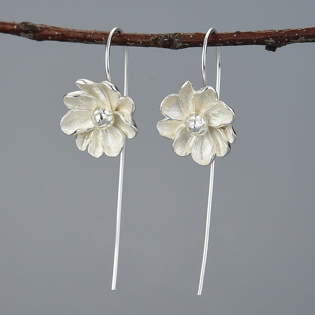 Elegant sterling silver petal long earrings